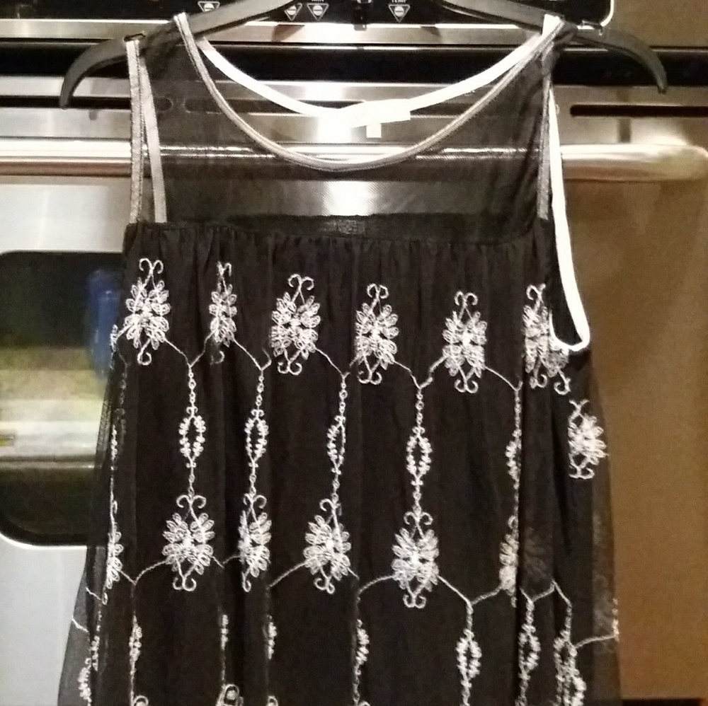 Top with sheer above chest,very nice
